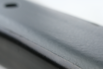 Selektive Beschichtung einer Chassis-Komponente mit Dickschichtschutz