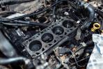 Damaged and corroded engine compartment
